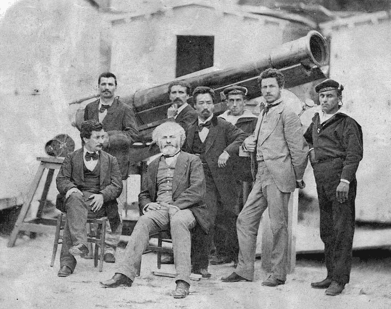 Янссен (в центре,сидит) и его команда в 1874 году на фоне револьвера