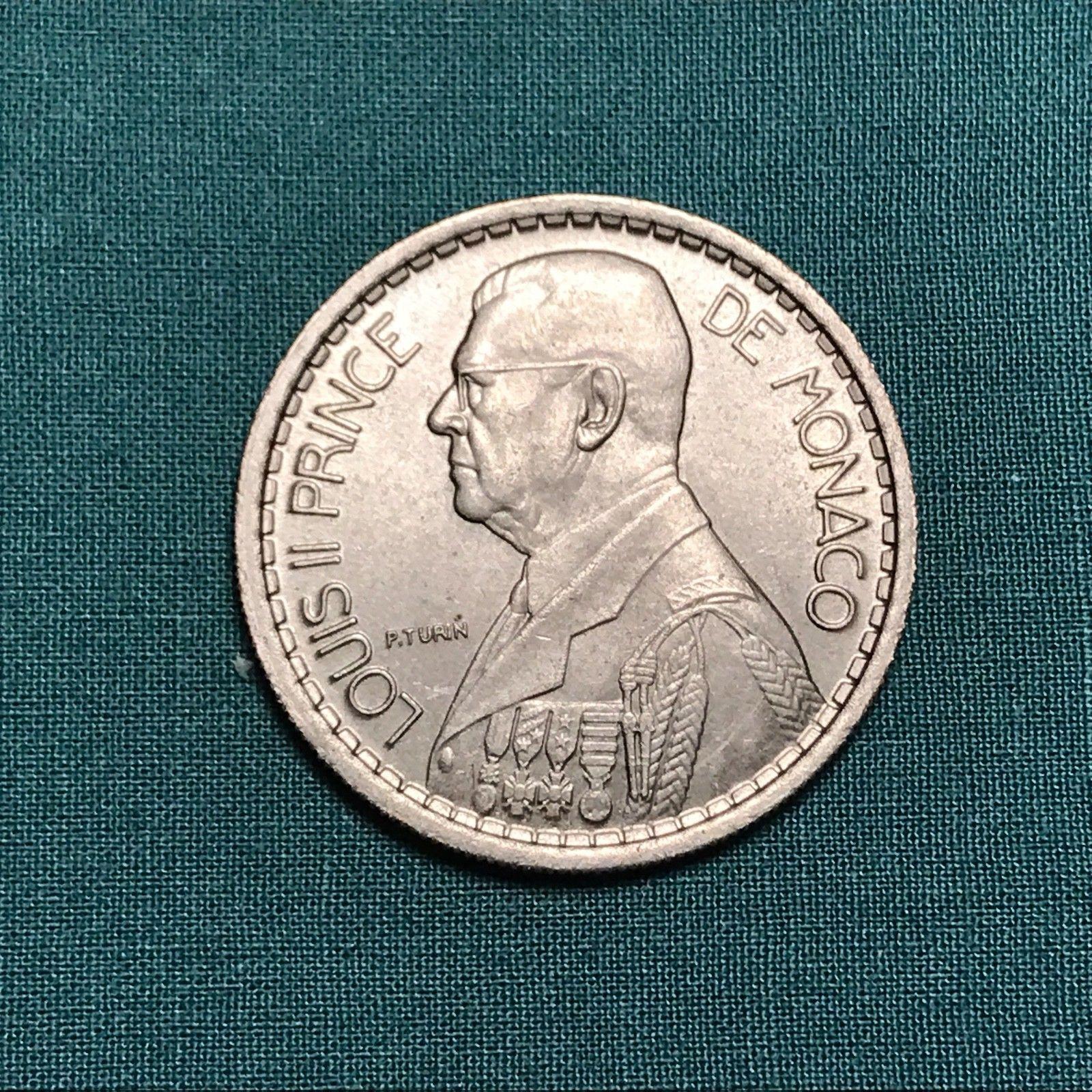 Цена монеты 10 франков (francs) 1946 года Монако: стоимость по аукционам с описанием и фото.